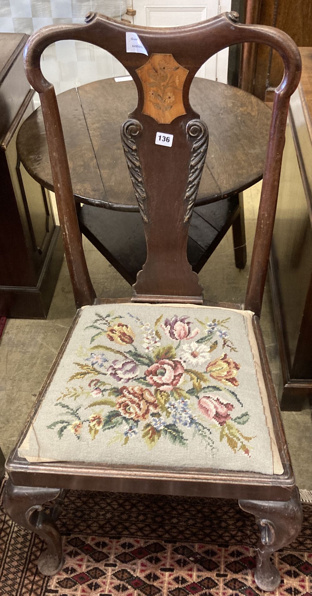 An 18th century Dutch marquetry inlaid mahogany dining chair